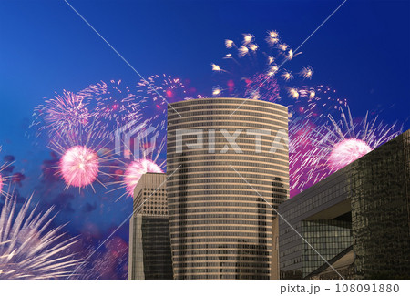 Celebratory fireworks over the Skyscrapers La Defense, commercial and business center of Paris, France 108091880