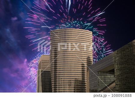 Celebratory fireworks over the Skyscrapers La Defense, commercial and business center of Paris, France Celebratory fireworks over the Skyscrapers La Defense, commercial and business center of Paris, France 108091888