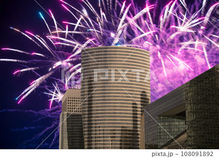 Celebratory fireworks over the Skyscrapers La Defense, commercial and business center of Paris, France Celebratory fireworks over the Skyscrapers La Defense, commercial and business center of Paris, France 108091892