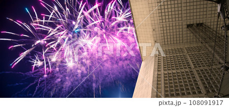 Celebratory fireworks over the La Grande Arche. La Defense, commercial and business center of Paris, France Celebratory fireworks over the La Grande Arche. La Defense, commercial and business center of Paris, France 108091917