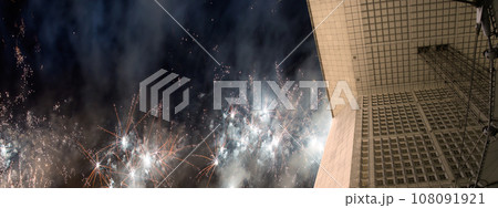 Celebratory fireworks over the La Grande Arche. La Defense, commercial and business center of Paris, France 108091921
