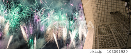 Celebratory fireworks over the La Grande Arche. La Defense, commercial and business center of Paris, France Celebratory fireworks over the La Grande Arche. La Defense, commercial and business center of Paris, France 108091929