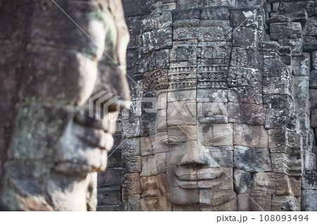 The stone faces of the khmer king on the wall of Bayon Temple, Angkor Thom, Siem Reap, Cambodia. 108093494