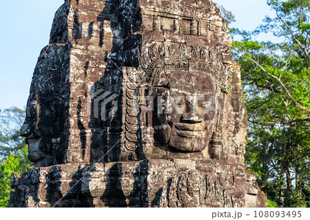 The stone faces of the khmer king on the wall of Bayon Temple, Angkor Thom, Siem Reap, Cambodia. 108093495