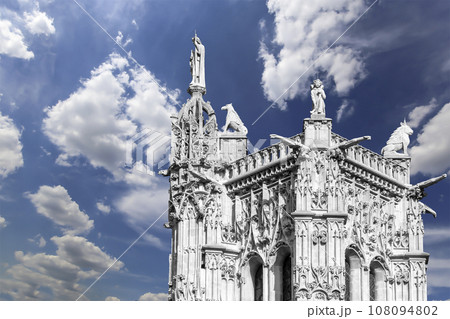 Saint-Jacques Tower (Tour Saint-Jacques) against the background of a beautiful sky with clouds. Located on Rivoli street, Paris, France. This 52 m Flamboyant Gothic tower (XVI century) 108094802