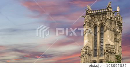 Saint-Jacques Tower (Tour Saint-Jacques) against the background of a beautiful sky at sunset. Located on Rivoli street, Paris, France. This 52 m Flamboyant Gothic tower (XVI century) Saint-Jacques Tower (Tour Saint-Jacques) against the background of a beautiful sky at sunset. Located on Rivoli street, Paris, France. This 52 m Flamboyant Gothic tower (XVI century) 108095085