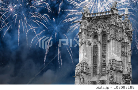 Celebratory colorful fireworks over the Saint-Jacques Tower (Tour Saint-Jacques). Located on Rivoli street, Paris, France. This 52 m Flamboyant Gothic tower (XVI century) 108095199