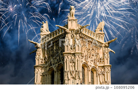 Celebratory colorful fireworks over the Saint-Jacques Tower (Tour Saint-Jacques). Located on Rivoli street, Paris, France. This 52 m Flamboyant Gothic tower (XVI century) 108095206