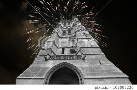Celebratory colorful fireworks over the Saint-Jacques Tower (Tour Saint-Jacques). Located on Rivoli street, Paris, France. This 52 m Flamboyant Gothic tower (XVI century) 108095220