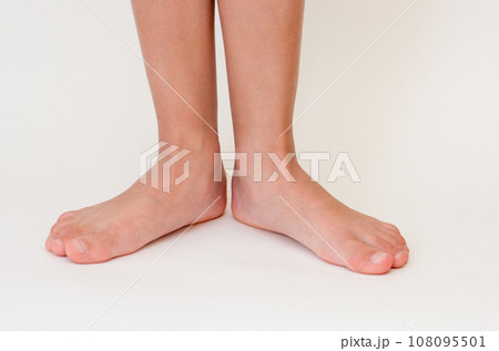 Cropped barefoot child legs  108095501