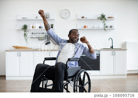 Young male in casual clothes spending pastime indoors. 108095716