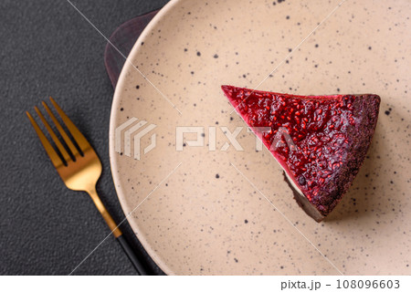 Delicious sweet cheesecake cake with mascarpone cheese, raspberries and jam 108096603