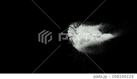 Nail spike under snow on road. Dangerous sharpen nail glass thing hidden in snow and can't see. Snow fall with risk accident hazard cover trash garbage debris. Black background isolated. Nail spike under snow on road. Dangerous sharpen nail glass thing hidden in snow and can't see. Snow fall with risk accident hazard cover trash garbage debris. Black background isolated. 108100228