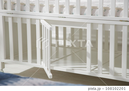 cozy bedroom with baby bed and lamp cozy bedroom with baby bed and lamp 108102201