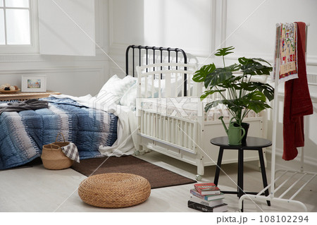cozy bedroom with baby bed and lamp cozy bedroom with baby bed and lamp 108102294