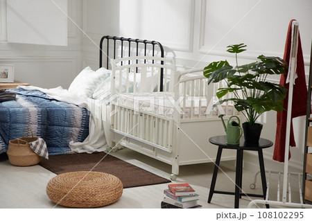 cozy bedroom with baby bed and lamp cozy bedroom with baby bed and lamp 108102295