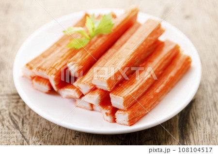 Crab sticks on white plate. Crab sticks on white plate. 108104517