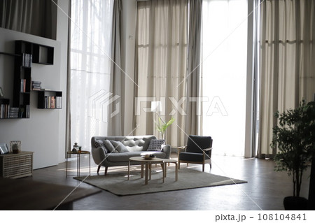 white living room with black and white walls 108104841