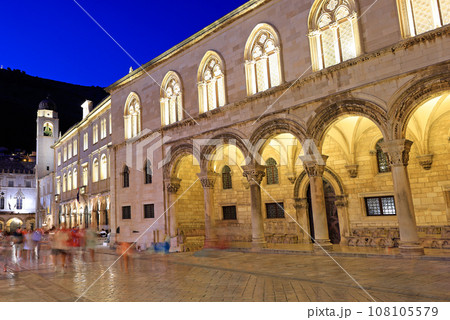 Ancient street in Dubrovnik illuminated at dusk with Rector Palace on the foreground, Croatia Ancient street in Dubrovnik illuminated at dusk with Rector Palace on the foreground, Croatia 108105579