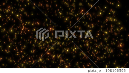 Abstract bright background of flying yellow glowing orange fire sparks from a fire on a black background Abstract bright background of flying yellow glowing orange fire sparks from a fire on a black background 108106596