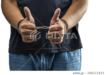 Arrested man with a handcuff on his hand Arrested man with a handcuff on his hand 108111915