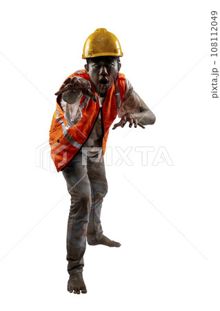 A scary construction worker zombie with blood and wounds on his body walking 108112049