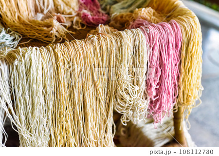 Many colorful prepared threads for weaving hammocks in vietnam Many colorful prepared threads for weaving hammocks in vietnam 108112780