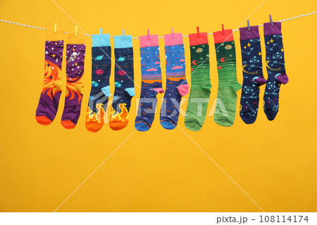 Casual clothes and wearing concept - socks, clothes for foot 108114174