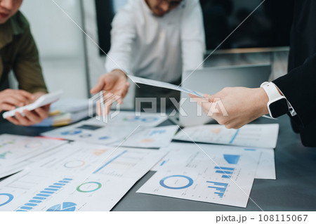 startup Asian business advisor meeting to analyze and discuss the situation on the financial report in the meeting room.Investment Consultant, Financial , teamwork ,brainstorming and accounting 108115067