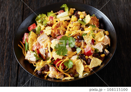 mexican rotisserie chicken salad in black bowl mexican rotisserie chicken salad in black bowl 108115100