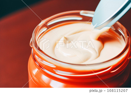 A jar of soft white chocolate. 108115207