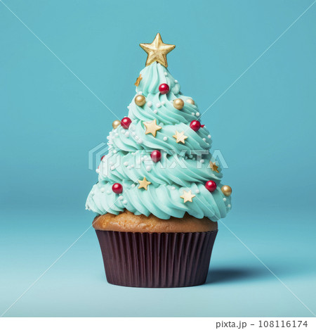 Christmas cupcake with a Christmas tree decoration  108116174