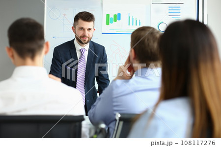Smiling businessman and team conference 108117276