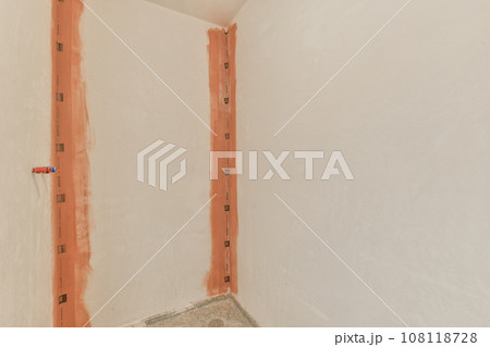 a bathroom being remodeled and ready for reurrectionments to be installed on the wall in the shower room a bathroom being remodeled and ready for reurrectionments to be installed on the wall in the shower room 108118728