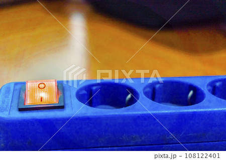 Blue power strip with orange switch Blue power strip with orange switch 108122401
