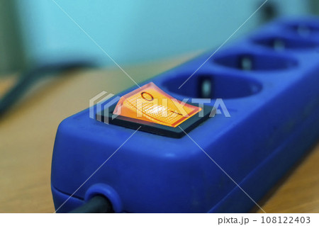 Blue power strip with orange switch Blue power strip with orange switch 108122403