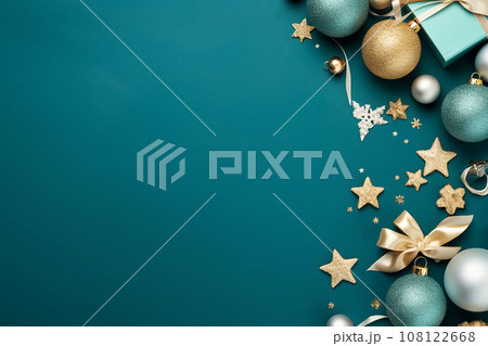 Christmas balls, stars and decoration details on blue background flat lay, top view. Happy New Year concept, free space for text, Christmas greetings card template 108122668