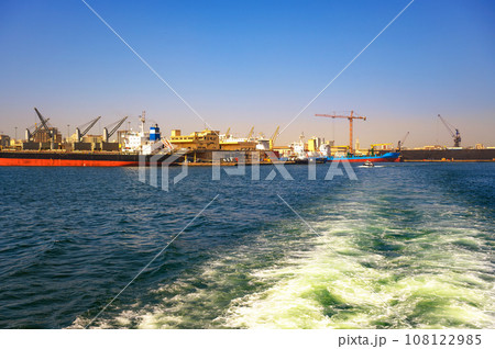 Port of Dakar in Senegal with big cargo ships, cranes and heavy cargo containers 108122985