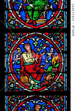 Colorful stained glass window in the Notre Dame Cathedral, UNESCO World Heritage Site in Paris, France Colorful stained glass window in the Notre Dame Cathedral, UNESCO World Heritage Site in Paris, France 108123645