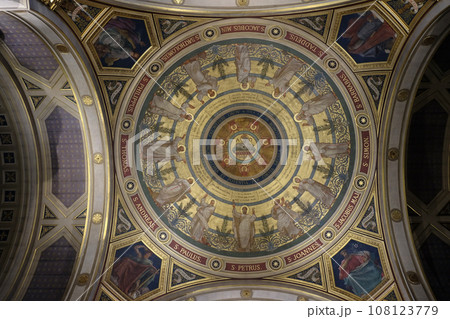 The painting of the cupola represents The Paschal Lamb and the Seven Seals, St Francis Xavier's Church in Paris, France 108123779
