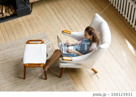 Young freelance employee woman working from home Young freelance employee woman working from home 108123931