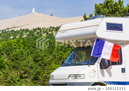 Caravan in mountains. Mont Ventoux in the distance. Provance 108125331