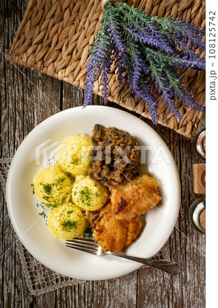 Fried cod fillet . 108125742