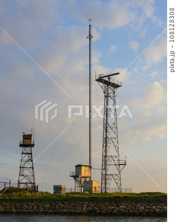 Various harbor communication towers with radar, communication, navigation and observation equipment 108128308