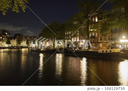 Majestic Amsterdam at night. Summer city landscape. Panorama Majestic Amsterdam at night. Summer city landscape. Panorama 108129730