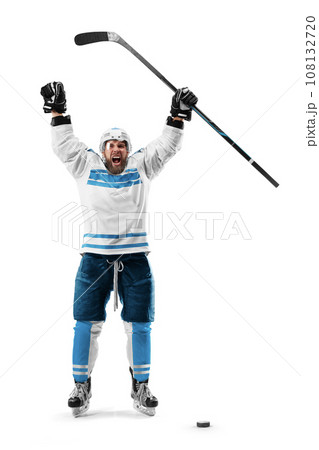 Very emotional hockey player with stick in his hands. Sports emotions. Athlete in action. Hockey champion with desire to win 108132720