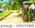 緑の多い公園にある電話ボックスイメージ 108133866