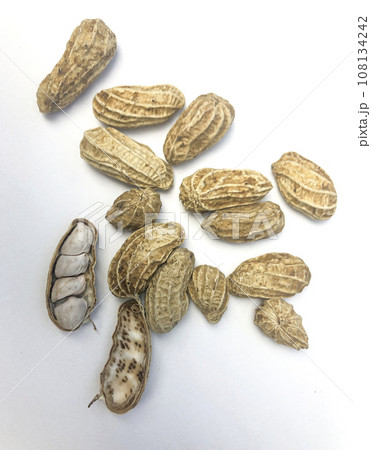 Peanuts isolated on a white background Peanuts isolated on a white background 108134242