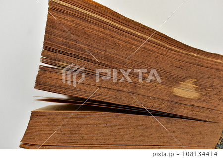 close up brown old book isolated on white background, vintage style 108134414