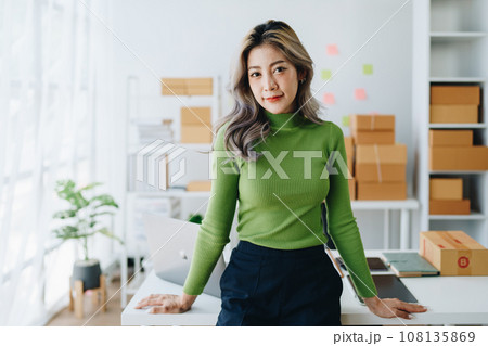 Portrait Of Asian Female Owner Of Fashion Store Clothing Store successful happy smile at small business, sme or ecommerce concepts. 108135869